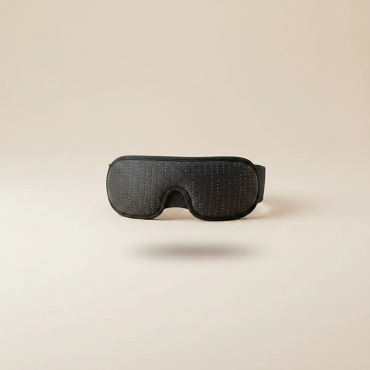 Sleep mask floating on beige background